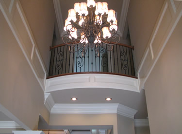 Two story foyer with juliet balcony.