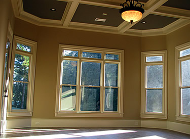 Master bedroom with coffered ceiling.