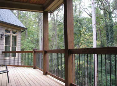 The back deck with cypress handrails.