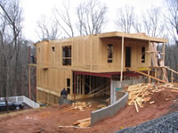 The first floor framing is nearly complete.